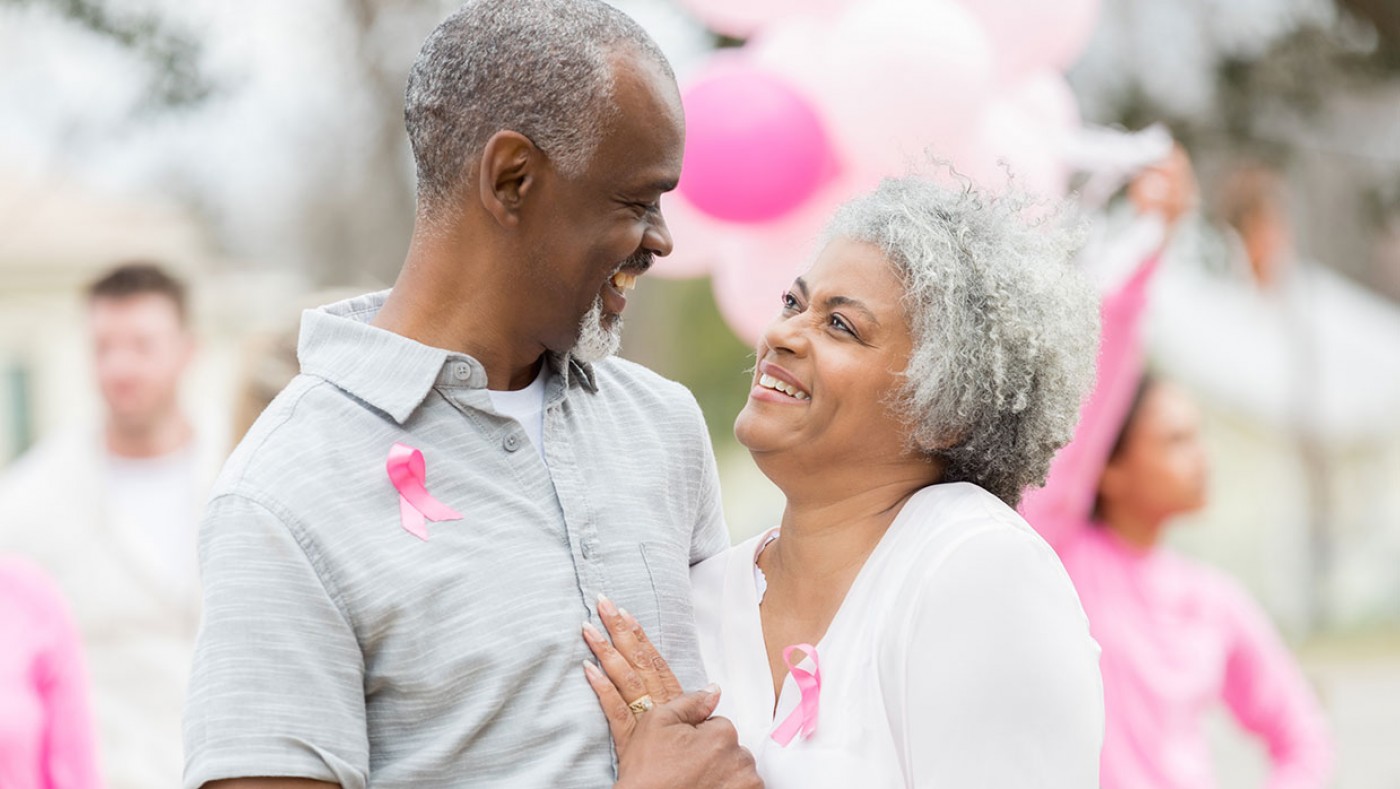 older couple supporting breast cancer awareness