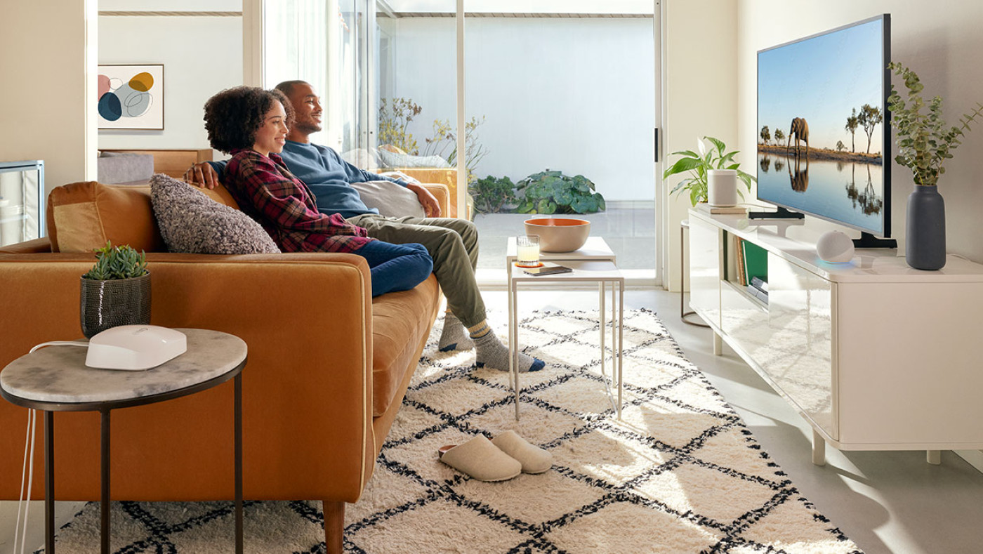 couple watching tv at home