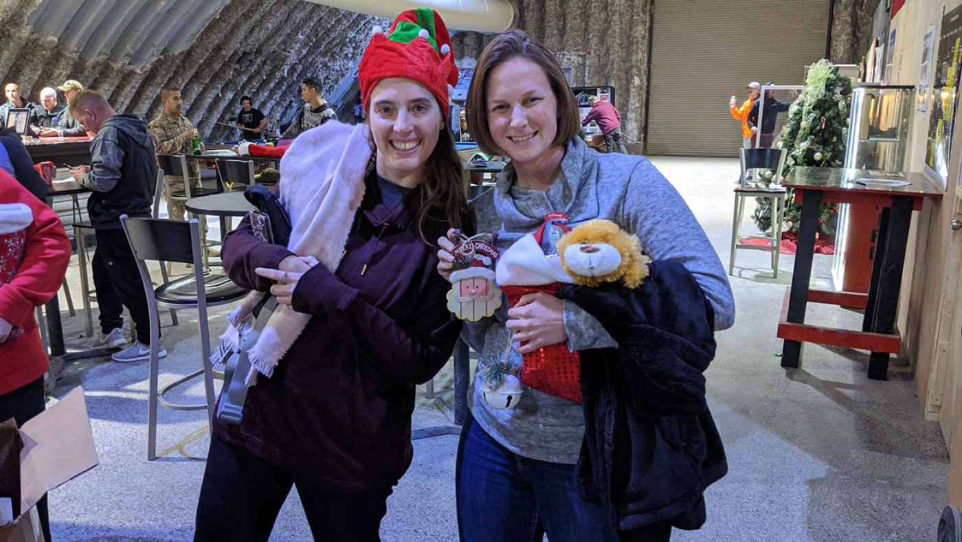female soldiers displaying holiday cheer